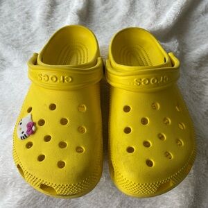 CROCS Bright Yellow Clogs with Character Charm
